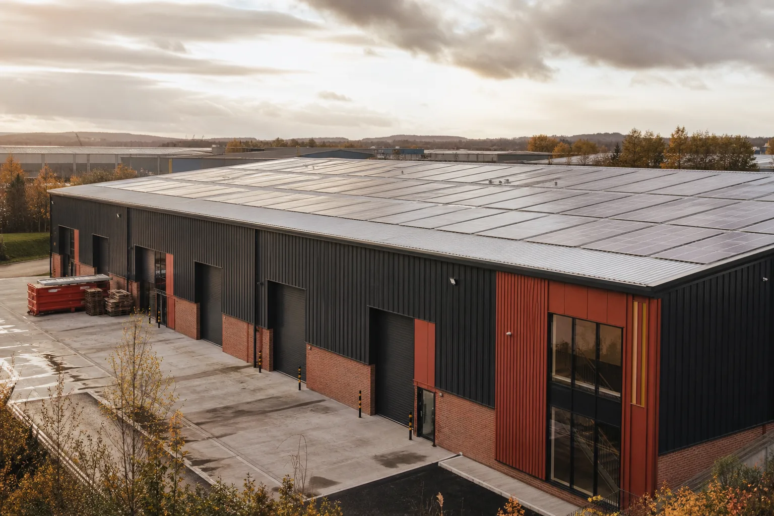 An industrial unit roof with solar panels and modern cladding, the kind of EPC upgrade that restores lettability