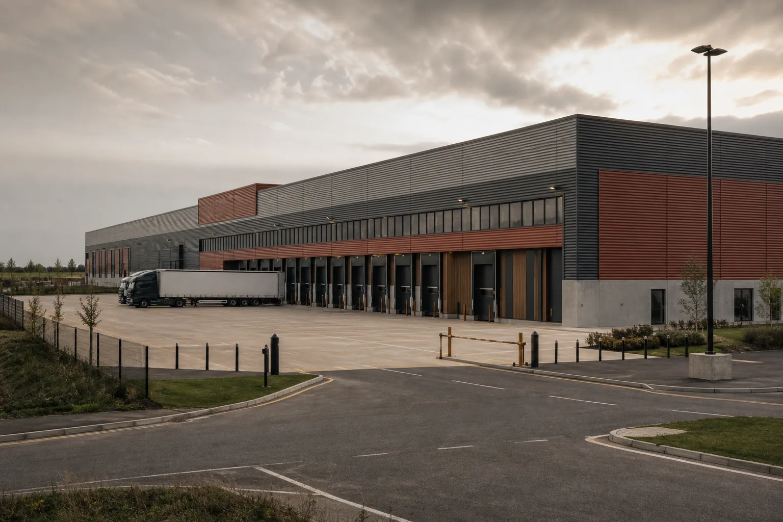 A modern B8 distribution warehouse with loading docks and an HGV yard, the typical home of storage and distribution use
